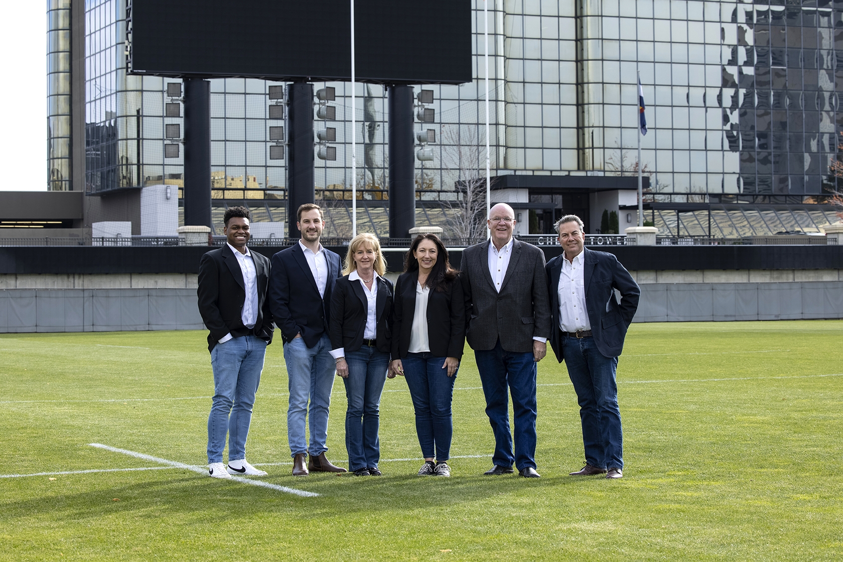 Continuum team members on a sports field